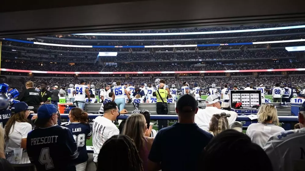 View of the Dallas Cowboys bench from the Miller Lite Club. Field Suites on the Visitors side have access to the DraftKings Lounge with the same experience. 