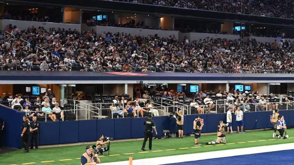 Comfortable leather seats within Touchdown Suites at AT&T Stadium.