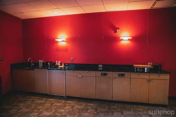 Wet bar within suite.